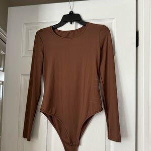 Dark brown body suit never worn only tried on